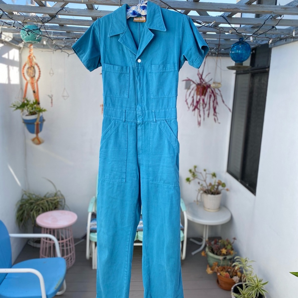 Big Bud Press Blue Jumpsuit with Collared Neckline and Fitted Waist